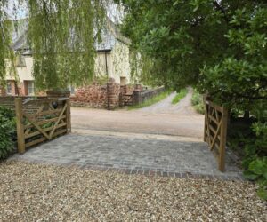 Block paving driveway entrance with new gates